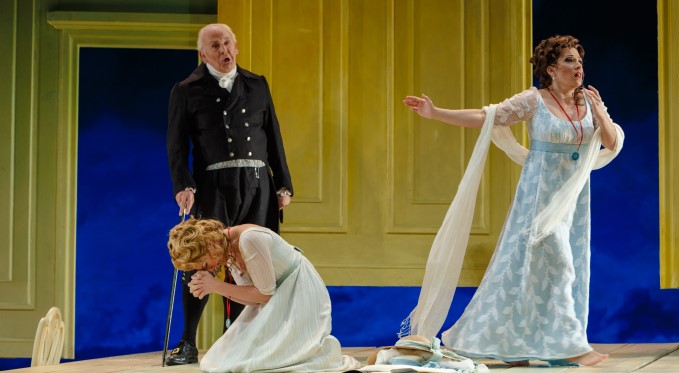 Don Alfonso tells Dorabella and Fiordiligi their fiancees have been called off to war. Photo: David Bachman Photography 