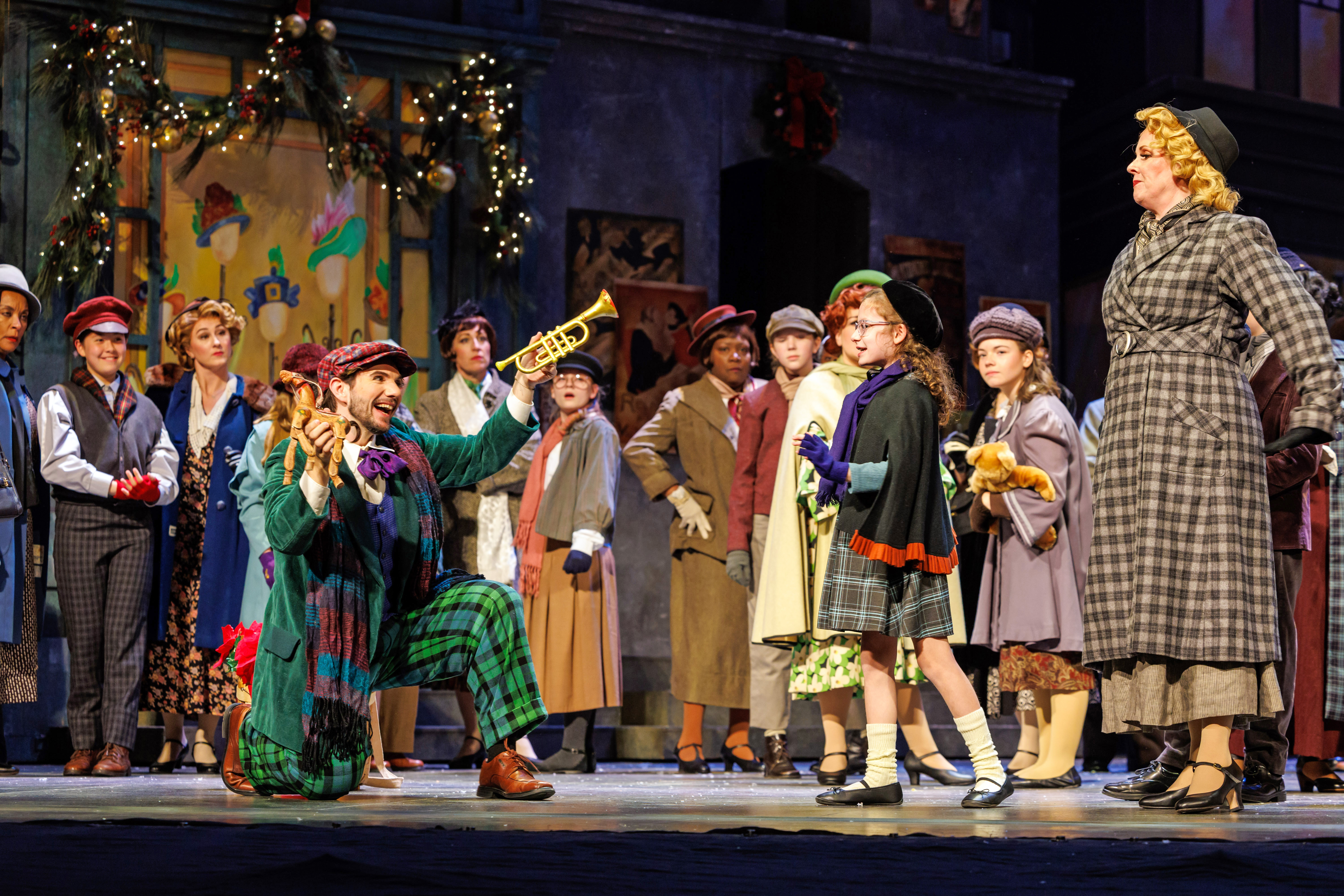 Logan Wagner as Parpignol in La Bohème (photo credit: David Bachman)