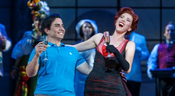 Ernesto (Javier Abreu) and Norina (Lisette Oropesa) toast to their future. Photo: David Bachman