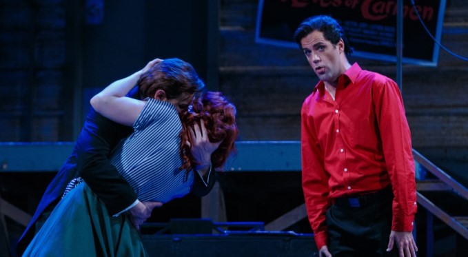 “Well, this is awkward.” Studio hair stylist Figaro (Jonathan Beyer) feels a little out of place as Almaviva (Michele Angelini) and Rosina (Corrie Stallings) share a long-awaited kiss. Photo by David Bachman.