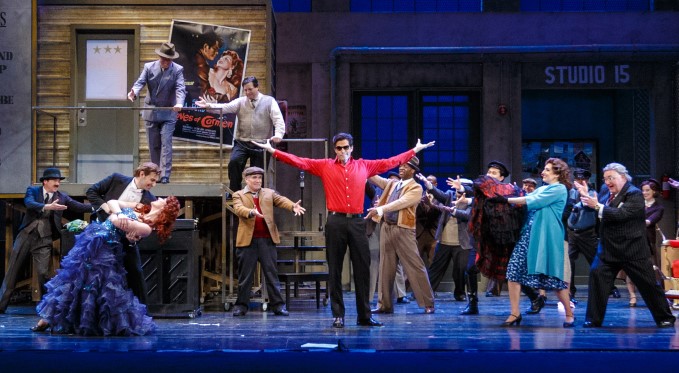 Figaro (Jonathan Beyer) leads the multitudes in celebrating Rosina (Corrie Stallings) and Almaviva (Michele Angelini)’s marriage. Photo by David Bachman.