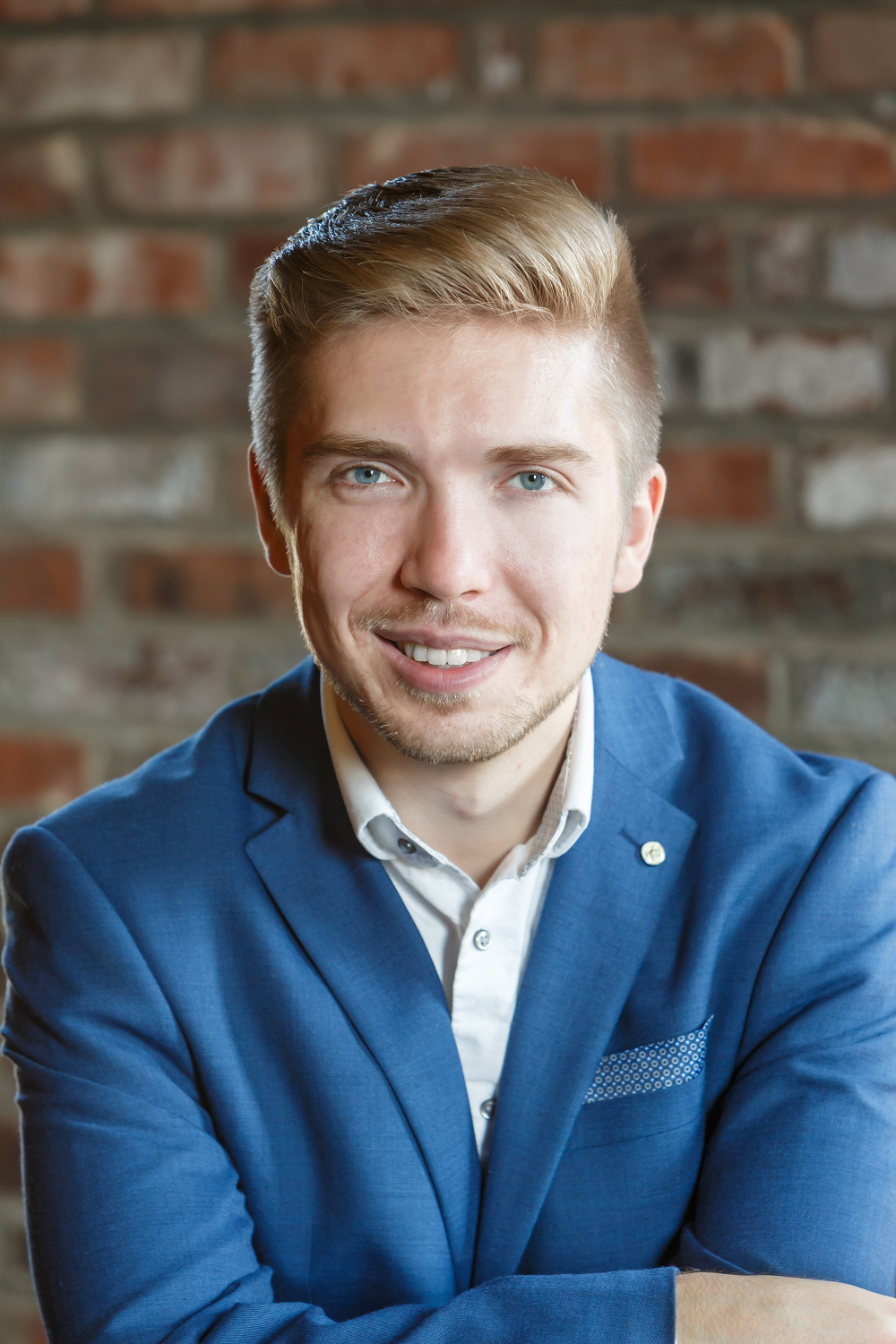 A headshot of Evan Lazdowski