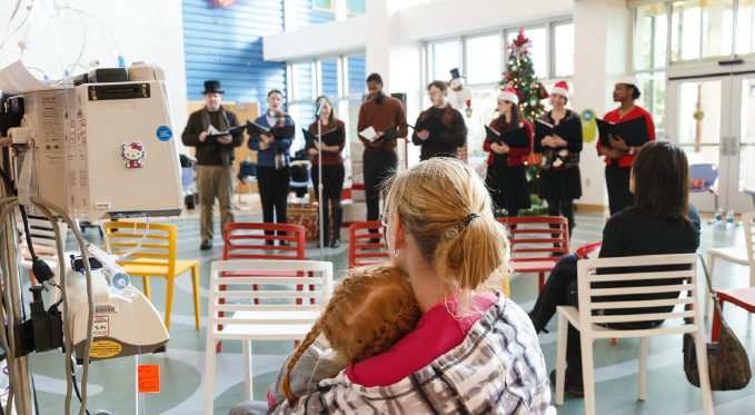 The Resident Artists entertain kids and their families at Children's Hospital at holiday time.