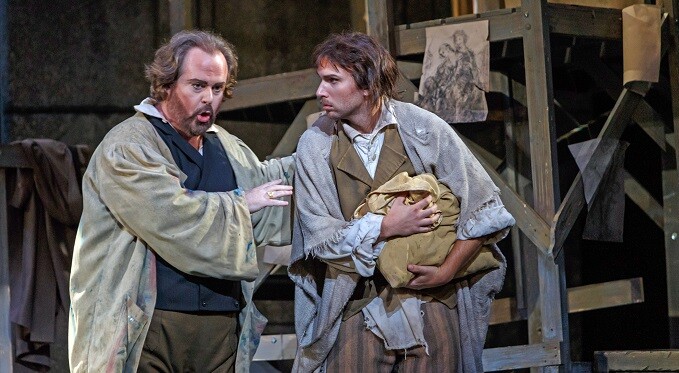 Cavaradossi (Jonathan Burton) aids escaped political prisoner Cesare Angelotti (Erik Nordstrom) (photo credit: David Bachman)