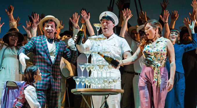 Belcore (Zachary Nelson) and Adina (Ekaterina Siurina) fill a champagne fountain at their engagement party. Photo By: David Bachman