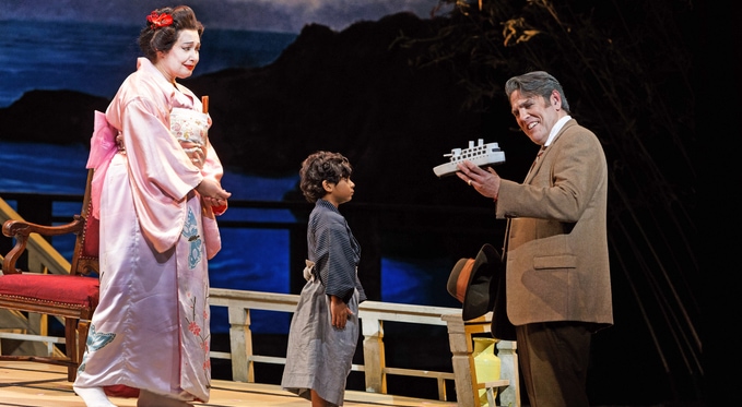 Cio-Cio San’s (Dina Kuznetsova) son Trouble (Aidyn Rayan Dasgupta) gives Sharpless (Michael Mayes) a toy ship. Photo by David Bachman for Pittsburgh Opera.