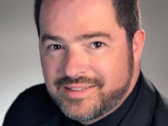 A headshot of Glenn Lewis